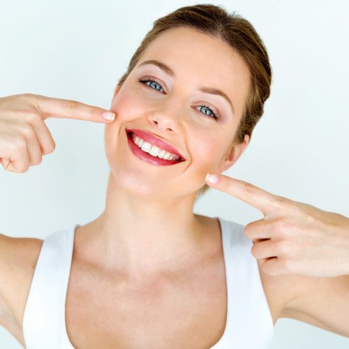 Beautiful woman with healthy Teeth smile