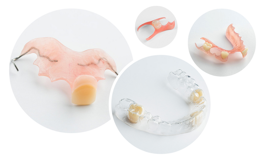 Dental models and tools on a white background