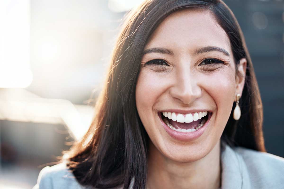 a woman smiling at the camera