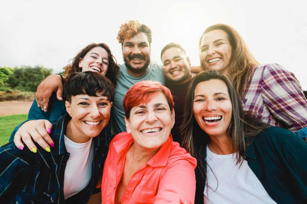 a group of people smiling at the camera